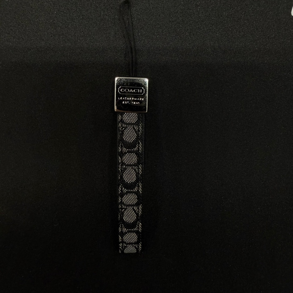 Coach Signature Black and Gray monogram silver phone strap